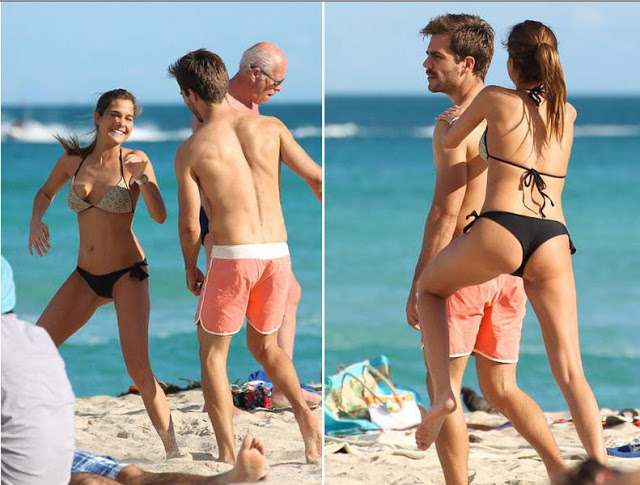 Natalia Sánchez jugando en la playa con su novio